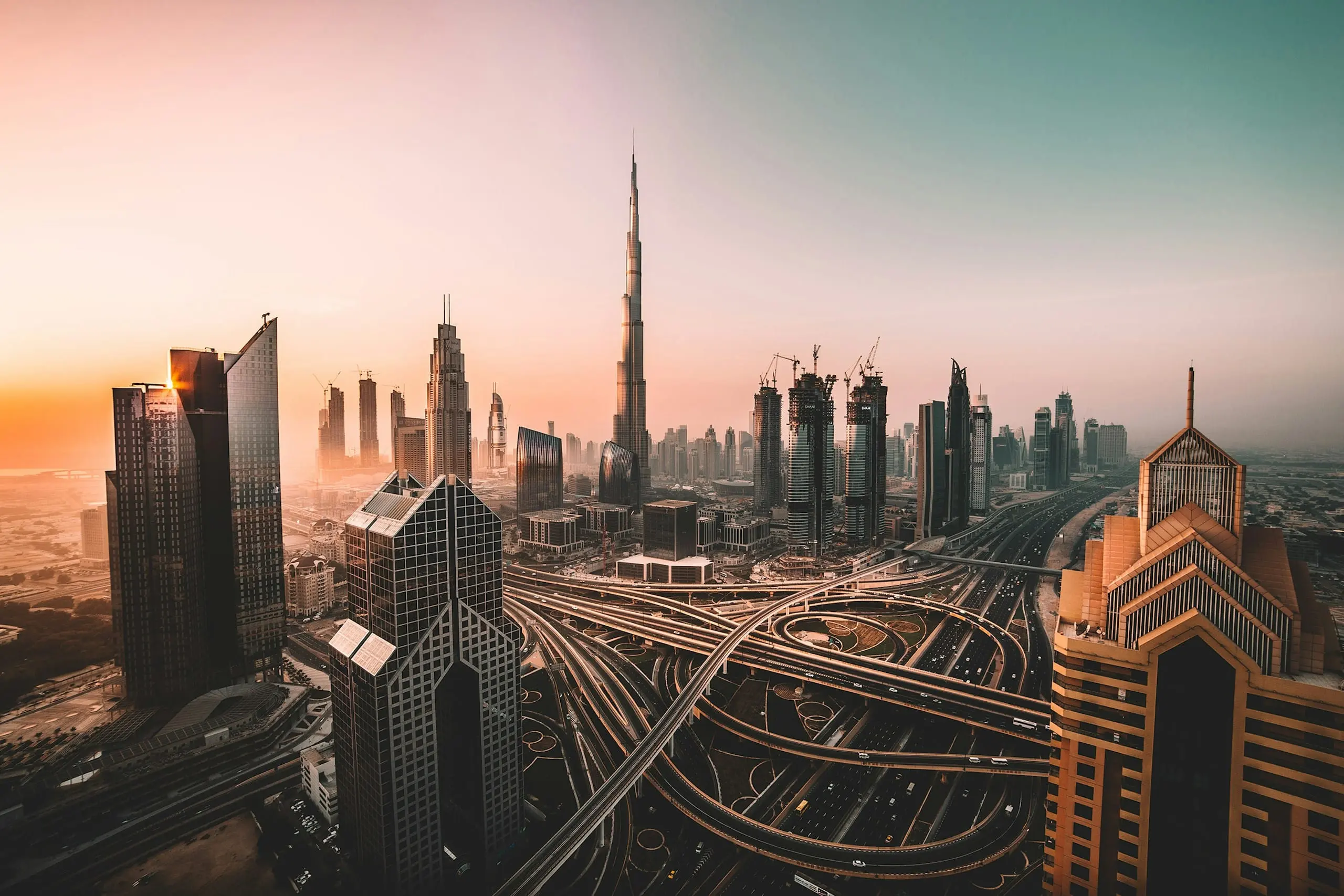 Downtown Dubai and the Burj Khalifa glowing in golden evening light