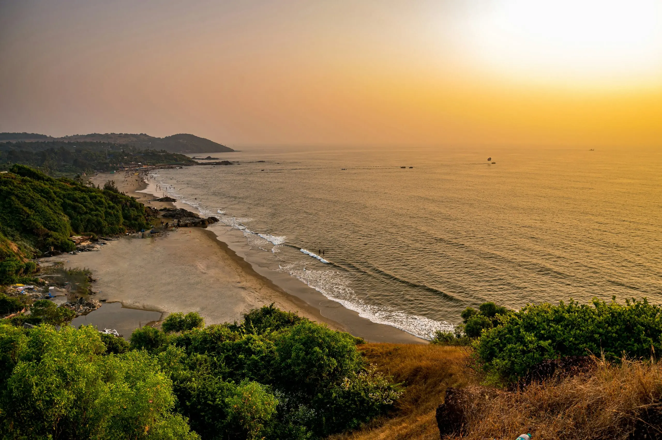 Golden sunset over a quiet cove in South Goa